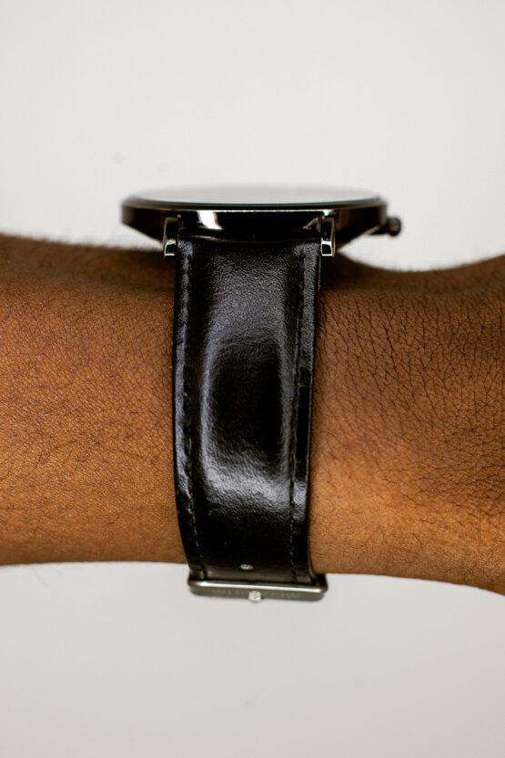 side view of Whollow black panther leather fashion watch for men and women
